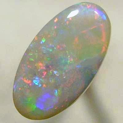 SOLID SEMI BLACK OPAL Bright multicolour. From candy red with blue and green playing in the background.  *****REDUCED*****