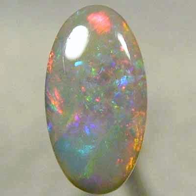 SOLID SEMI BLACK OPAL Bright multicolour. From candy red with blue and green playing in the background.  *****REDUCED*****