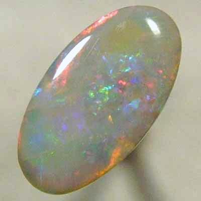 SOLID SEMI BLACK OPAL Bright multicolour. From candy red with blue and green playing in the background.  *****REDUCED*****