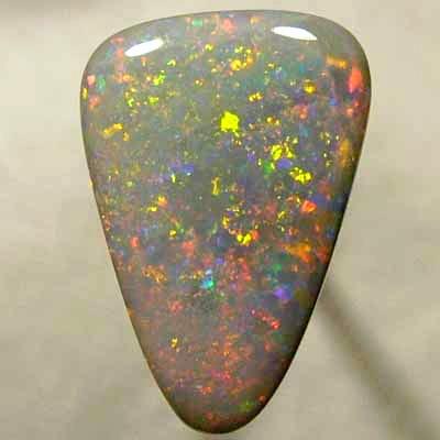 SOLID SEMI BLACK OPAL Large opal with a very 3 dimensional Pinfire pattern with rolling flashes. WITH VIDEO