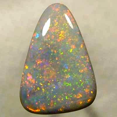 SOLID SEMI BLACK OPAL Large opal with a very 3 dimensional Pinfire pattern with rolling flashes. WITH VIDEO