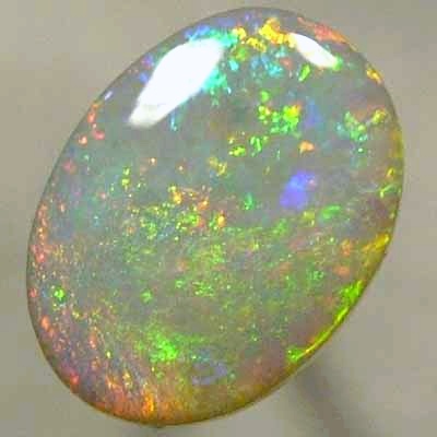 SOLID SEMI BLACK OPAL multicoloured sparkles of red, orange, yellow, green, blue and purple