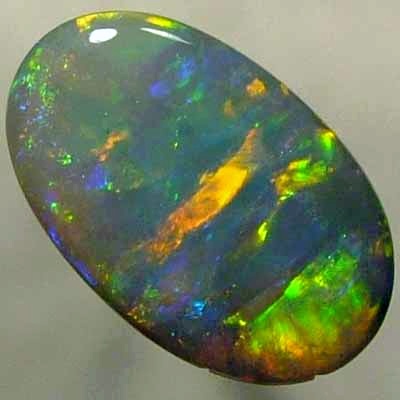 SOLID SEMI BLACK OPAL Glassy rolling flashes of orange and green, blue and yellow. With VIDEO