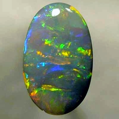 SOLID SEMI BLACK OPAL Glassy rolling flashes of orange and green, blue and yellow. With VIDEO