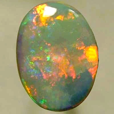 SOLID CRYSTAL OPAL Neon red moves in the cleanest rolling flashes contrasted by crispy green