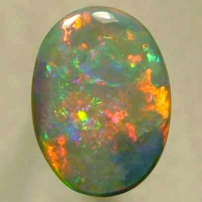 SOLID CRYSTAL OPAL Neon red moves in the cleanest rolling flashes contrasted by crispy green