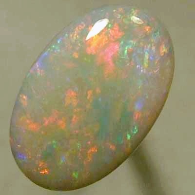 SOLID SEMI BLACK OPAL Candy red mixes with light green and blue, sparkles always.