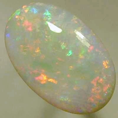 SOLID SEMI BLACK OPAL Candy red mixes with light green and blue, sparkles always.