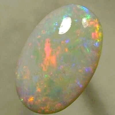 SOLID SEMI BLACK OPAL Candy red mixes with light green and blue, sparkles always.