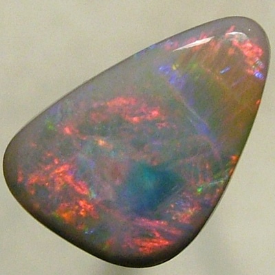 SOLID SEMI BLACK OPAL Large rolling flashes of reds to green to blue to red