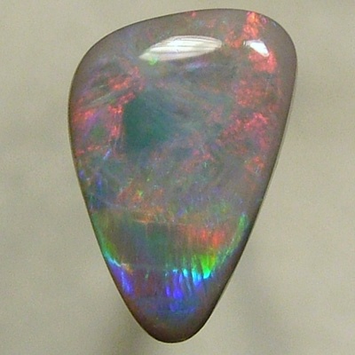 SOLID SEMI BLACK OPAL Large rolling flashes of reds to green to blue to red