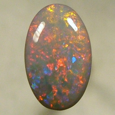 SOLID SEMI BLACK OPAL Pretty opal with red sparkling with blue in between