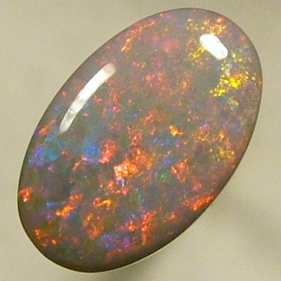 SOLID SEMI BLACK OPAL Pretty opal with red sparkling with blue in between