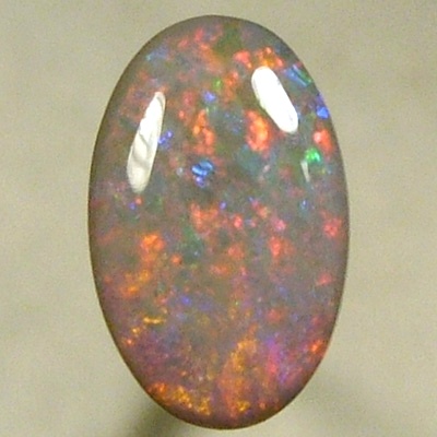 SOLID SEMI BLACK OPAL Pretty opal with red sparkling with blue in between