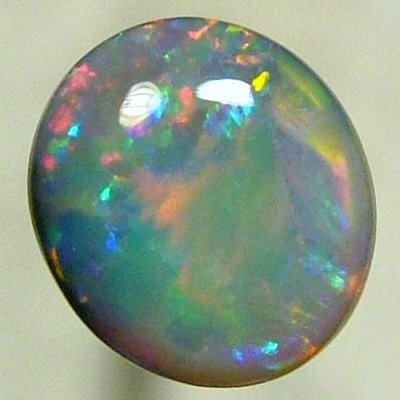 SOLID SEMI BLACK OPAL A red Flame pattern moves over gemmy green