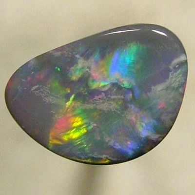SOLID SEMI BLACK OPAL Rainbow rolling flashes from red to green to purple