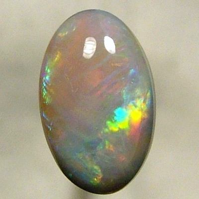 SOLID CRYSTAL OPAL Rolling flashes red to purple, green to blue