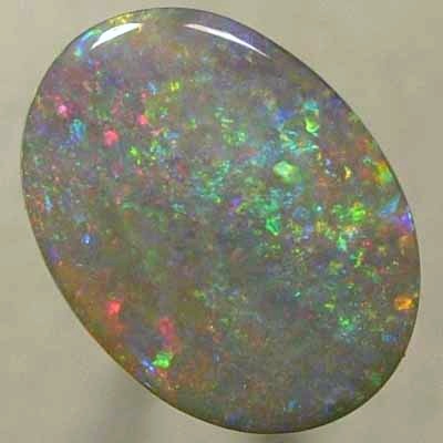 SOLID SEMI BLACK OPAL Red oozes between orange, green and purple