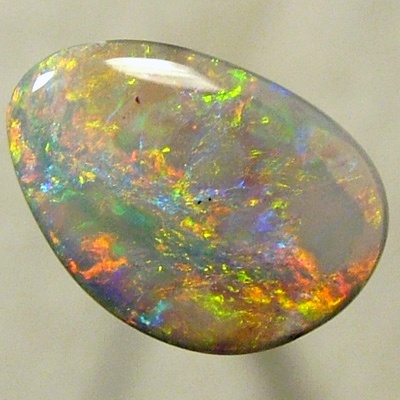 SOLID SEMI BLACK OPAL Very bright with red and orange over green and turquoise