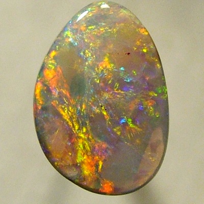 SOLID SEMI BLACK OPAL Very bright with red and orange over green and turquoise