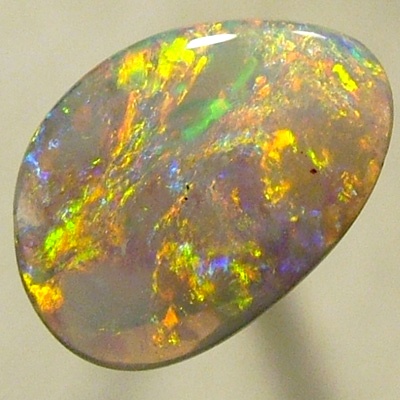 SOLID SEMI BLACK OPAL Very bright with red and orange over green and turquoise