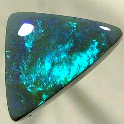 SOLID BLACK OPAL Double sides opal with rolling flashes of green shades.