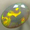 SOLID SEMI BLACK OPAL Clean orange to green rolling flashes, bright and sharp over a purple hue