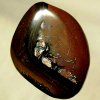 SOLID BOULDER OPAL Real Aussie icon, a boomerang engulfing bright red fire.